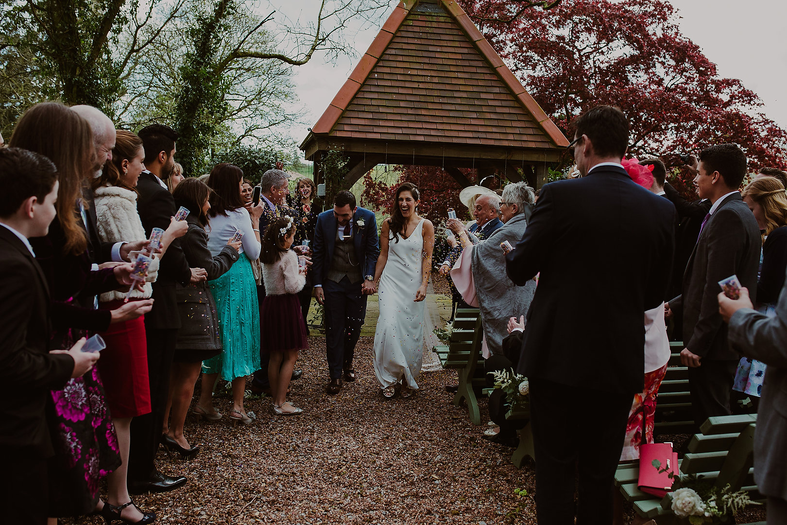 Lara and Ben Gatsby inspired garden wedding with symbolic crystal healing. Samantha Kelsie UK Celebrant. Huntsham Court. Bears Collective Photography.
